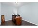 Bright home office with modern desk, window for natural light, and sleek wood floors perfect for productivity at 1981 Lindsey Ln, Decatur, GA 30035
