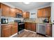 Well-equipped kitchen features stainless steel appliances, granite countertops, and ample cabinet space at 1981 Lindsey Ln, Decatur, GA 30035