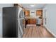 Modern kitchen boasts stainless steel appliances, sleek countertops, and wood cabinets, offering a stylish and functional space at 1981 Lindsey Ln, Decatur, GA 30035