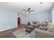 Spacious living room featuring hardwood floors and a ceiling fan at 1981 Lindsey Ln, Decatur, GA 30035