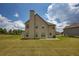 Expansive backyard featuring a well-maintained lawn, perfect for outdoor activities and entertaining at 200 Baumgard Way, Locust Grove, GA 30248