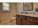 Granite vanity in bathroom with ample lighting and neutral wall color at 200 Baumgard Way, Locust Grove, GA 30248