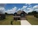 Beautiful two-story home with a well-maintained lawn, charming curb appeal, and an attached two-car garage at 200 Baumgard Way, Locust Grove, GA 30248