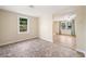 Cozy dining area with neutral walls, tile floor, and a window overlooking the backyard at 2570 Curtis Sw Rd, Marietta, GA 30064