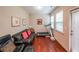 Comfortable exercise room featuring a treadmill and a comfortable seating area at 4007 Fellowship Dr, Buford, GA 30519