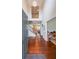 Grand foyer with hardwood floors, a staircase, and a view into the living room at 4007 Fellowship Dr, Buford, GA 30519