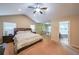 Main bedroom leading into bathroom and sitting room with lots of light at 4007 Fellowship Dr, Buford, GA 30519