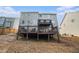 Back view of house highlighting a wooden deck for outdoor enjoyment and entertaining at 5288 Clingman Ct, Douglasville, GA 30135