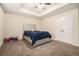 Bedroom features carpet, a ceiling fan, and ample space creating a cozy and inviting space at 5288 Clingman Ct, Douglasville, GA 30135
