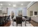 Cozy dining area features a modern table, stylish chairs, and elegant lighting fixture at 5288 Clingman Ct, Douglasville, GA 30135