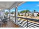 Inviting balcony featuring a view of neighborhood, stylish seating, and wooden floors, perfect for relaxing at 5293 Hearthstone St, Stone Mountain, GA 30083