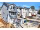 Rear exterior of the homes showing patios, decks, garages and fencing at 5293 Hearthstone St, Stone Mountain, GA 30083