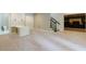 Finished basement area with a built-in desk, media room and staircase at 1617 Windsor Ne Pkwy, Brookhaven, GA 30319