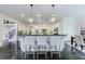 Kitchen island featuring granite countertops and views to additional areas of the home at 1617 Windsor Ne Pkwy, Brookhaven, GA 30319