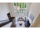 High angle view of two-story living room and staircase leading to an upper level at 1617 Windsor Ne Pkwy, Brookhaven, GA 30319