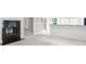 Open living space includes fireplace, access to kitchen, french doors and neutral carpet at 1617 Windsor Ne Pkwy, Brookhaven, GA 30319