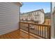 View from the deck showcasing the townhome's exterior and providing a glimpse of the surrounding community at 169 Wards Crossing Way # 125, Johns Creek, GA 30022