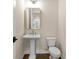 This powder room has a pedestal sink, gold faucet, and a square mirror, and is conveniently located at 169 Wards Crossing Way # 125, Johns Creek, GA 30022