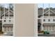 Shot through window of new construction townhomes with two-car garages at 169 Wards Crossing Way # 125, Johns Creek, GA 30022