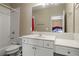Bathroom featuring a shower/tub combo, toilet, and vanity with a mirror at 1903 Brackendale Nw Rd, Kennesaw, GA 30152