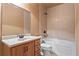 Inviting bathroom featuring a single vanity and tub-shower combination at 1903 Brackendale Nw Rd, Kennesaw, GA 30152