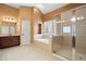 Bathroom featuring tile floors, soaking tub, glass shower, and vanity at 1903 Brackendale Nw Rd, Kennesaw, GA 30152