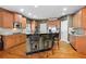 Well-equipped kitchen with granite countertops, stainless steel appliances, and a central island with seating at 1903 Brackendale Nw Rd, Kennesaw, GA 30152
