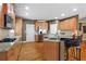 Bright kitchen with stainless steel appliances, granite countertops, and island seating at 1903 Brackendale Nw Rd, Kennesaw, GA 30152