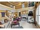 Inviting living room with a fireplace, two-story windows, and a balcony overlooking the space at 1903 Brackendale Nw Rd, Kennesaw, GA 30152
