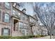 Beautiful brick townhomes featuring elegant balconies and meticulous landscaping at 1012 E Paces Chase Ne, Atlanta, GA 30326