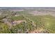 Discover vast wooded acreage on rural land, perfect for a private retreat, as seen from this high altitude aerial view at 1312 Mcgarity Rd, Temple, GA 30179