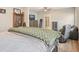 Spacious bedroom with a seating area, wood floors, and neutral paint tones provides comfort and style at 1312 Mcgarity Rd, Temple, GA 30179