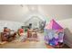 Spacious bonus room with desk, games, and a fun play tent for children at 1312 Mcgarity Rd, Temple, GA 30179