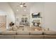 Bright and airy living room with vaulted ceiling, stone fireplace, and comfortable seating at 1312 Mcgarity Rd, Temple, GA 30179