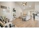 Spacious living room with vaulted ceilings, a fireplace, and plenty of natural light at 1312 Mcgarity Rd, Temple, GA 30179