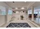 Open basement layout featuring decorative columns, an exercise area, and neutral paint at 4580 Lakefield Bend Bnd, Berkeley Lake, GA 30096