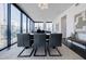 Chic dining area boasts floor-to-ceiling windows with abundant light and skyline views at 788 W Marietta Nw St # 1302, Atlanta, GA 30318