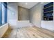 Dog washing station includes stainless-steel faucet, platform, and storage for pet care supplies at 788 W Marietta Nw St # 1302, Atlanta, GA 30318