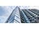 Exterior view of high-rise building showcasing glass windows, balconies, and modern design at 788 W Marietta Nw St # 1302, Atlanta, GA 30318