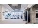 Well-equipped fitness center with treadmills, weight machines, and plenty of natural light at 788 W Marietta Nw St # 1302, Atlanta, GA 30318