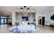 Welcoming lobby space featuring a modern sofa, decorative rug, and a large screen TV at 788 W Marietta Nw St # 1302, Atlanta, GA 30318
