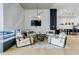 Cozy lounge area with a modern fireplace, comfortable seating, and stylish decor at 788 W Marietta Nw St # 1302, Atlanta, GA 30318