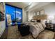Inviting main bedroom featuring a large window, stylish decor, and elegant furnishings at 788 W Marietta Nw St # 1302, Atlanta, GA 30318