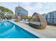 Stylish pool area with poolside lounge chairs, cabanas, and a relaxing atmosphere at 788 W Marietta Nw St # 1302, Atlanta, GA 30318
