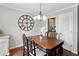 Inviting dining room with chandelier, hardwood floors, and neutral paint at 1540 Cedar Bluff Trl, Marietta, GA 30062