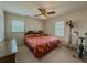 Bedroom features a plush carpet, double bed, and fitness equipment at 772 Garner Sw Rd, Lilburn, GA 30047