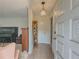 Cozy entryway with tile flooring, vintage chandelier, and decorative front door accents at 772 Garner Sw Rd, Lilburn, GA 30047