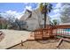 Backyard features stairs to second story deck and in-ground pool at 1364 Tsali Trl, Morrow, GA 30260