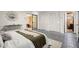 Bedroom featuring neutral paint, carpet flooring, sliding glass door to the exterior and a bathroom at 1364 Tsali Trl, Morrow, GA 30260