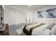 This bedroom has grey tile floors, white walls and trim, and two art pieces on the wall at 1364 Tsali Trl, Morrow, GA 30260
